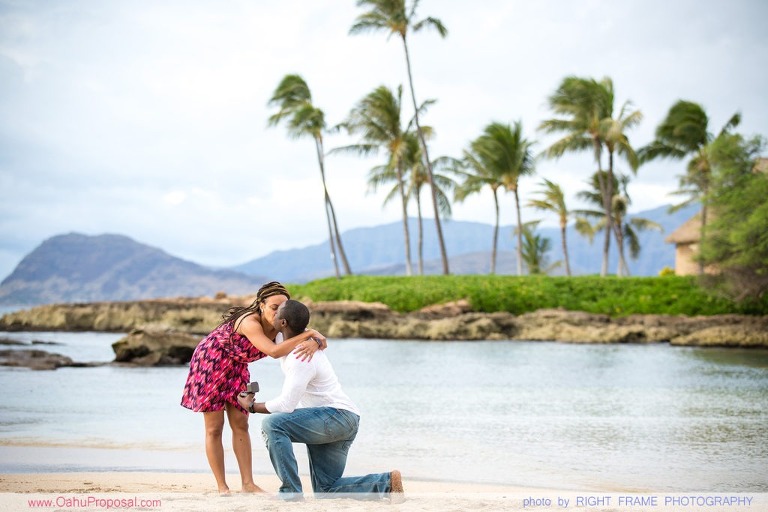 Proposal on a beach near Paradise Cove Luau Ko Olina Oahu Hawaii