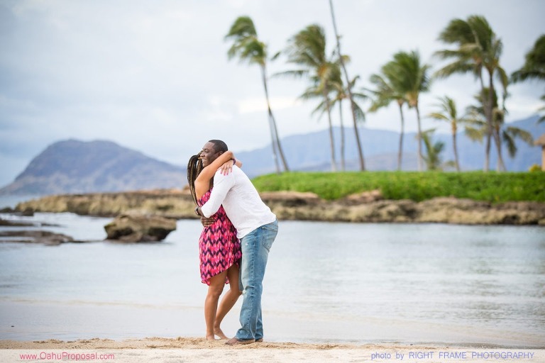Proposal on a beach near Paradise Cove Luau Ko Olina Oahu Hawaii