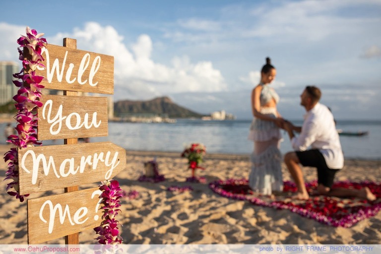 Sunset Proposal at Waikiki Beach with a rose petals heart in the sand