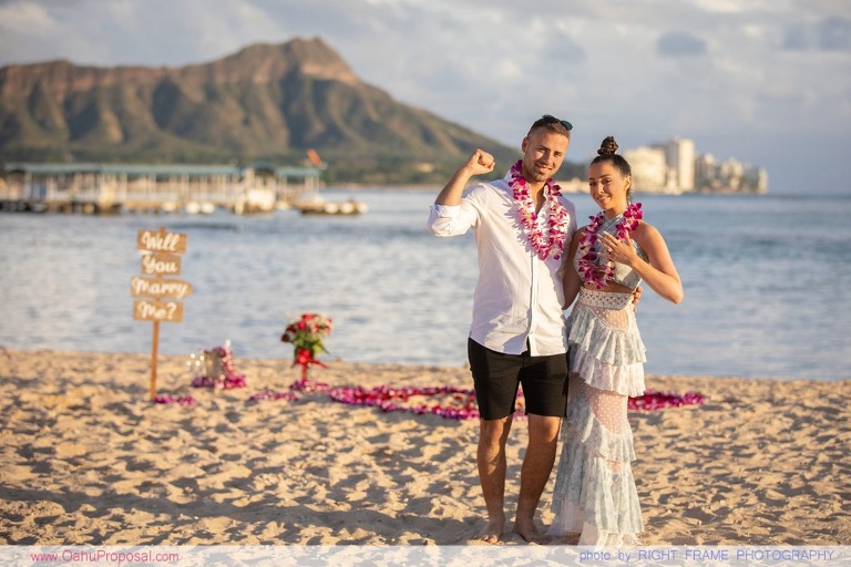 Sunset Proposal at Waikiki Beach with a rose petals heart in the sand