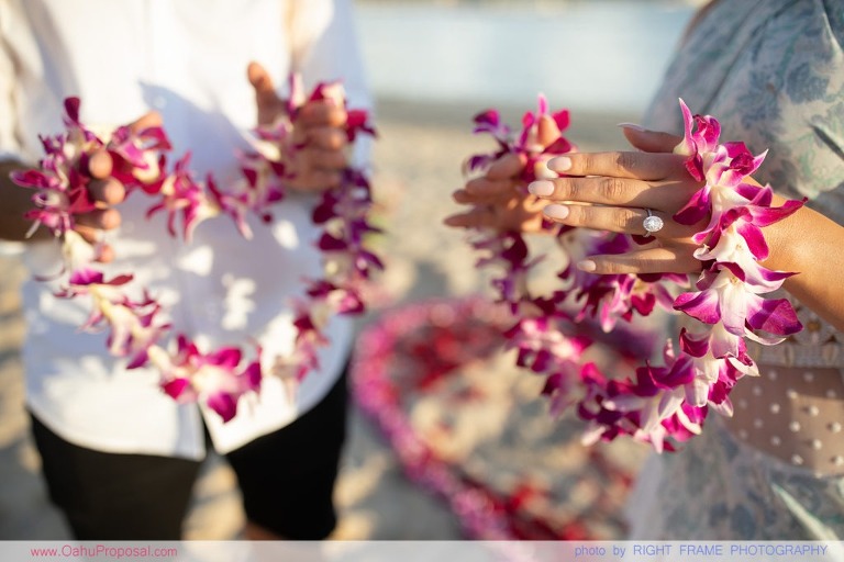 Sunset Proposal at Waikiki Beach with a rose petals heart in the sand