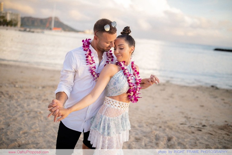 Sunset Proposal at Waikiki Beach with a rose petals heart in the sand
