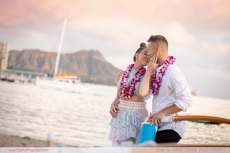 Sunset Proposal at Waikiki Beach with a rose petals heart in the sand