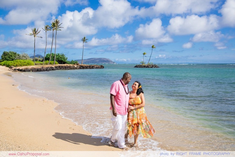 Surprise proposal under Palm Trees on Oahu Hawaii