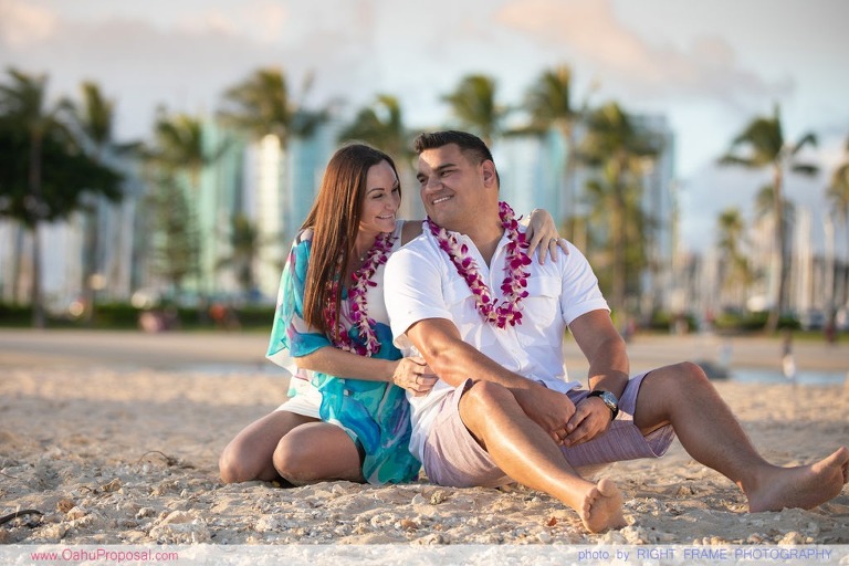 Surprise beach proposal with Diamond Head in the background Hawaii