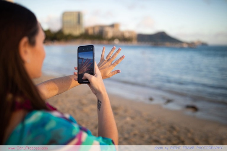 Surprise beach proposal with Diamond Head in the background Hawaii
