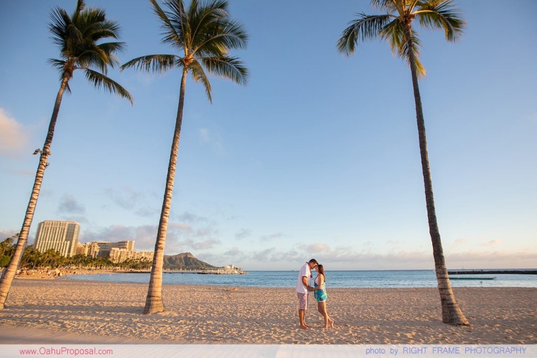 Surprise beach proposal with Diamond Head in the background Hawaii